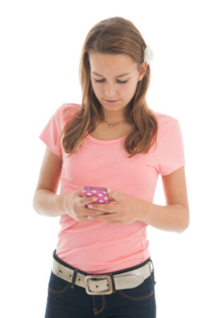 teenager using her smartphone looking at social media